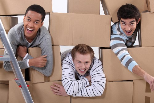 Furniture removal team handling a sofa move in Bow