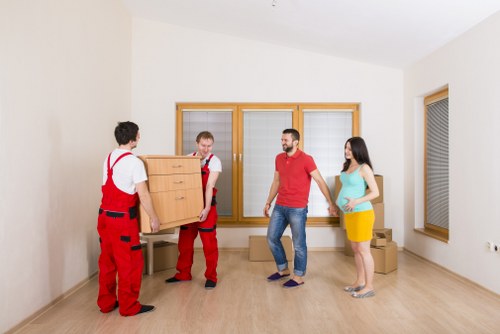 Careful loading of household furniture for a local Bow relocation