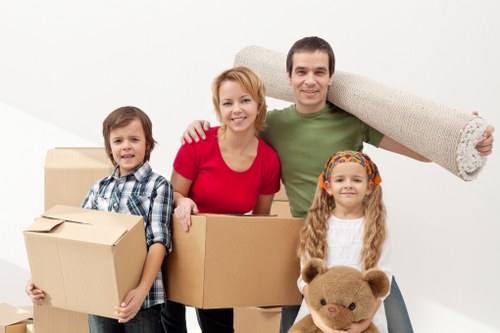 Careful handling of household furniture during a Bow home relocation