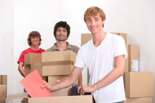 Packed furniture ready for transport from a Bow property