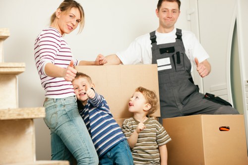 Packed boxes and furniture prepared for transport in East London